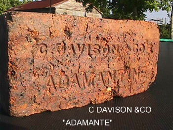 This brick found at the cistern was made by a brick company.